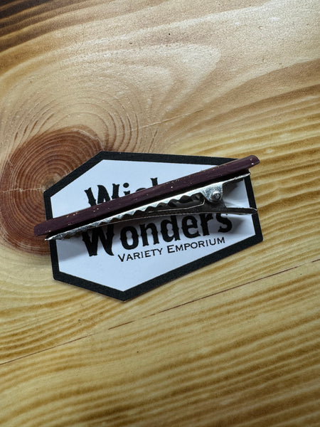 Maroon with gold hair clip