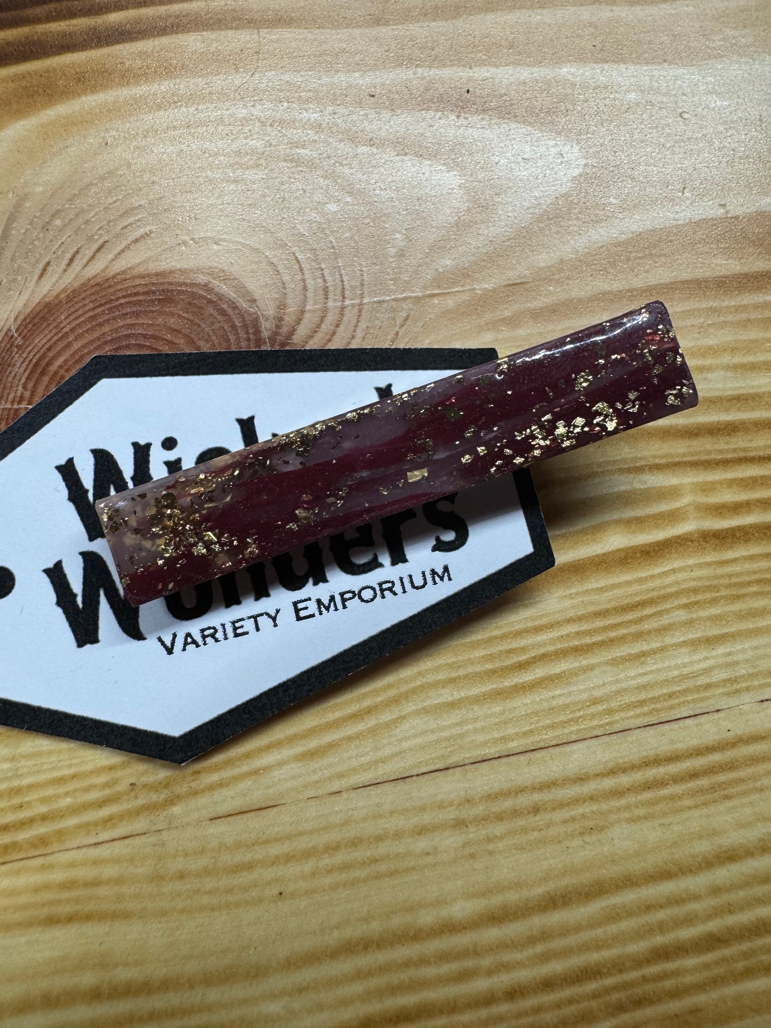 Maroon with gold hair clip